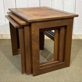 Set of 3 nesting tables in teak with tiled tops.