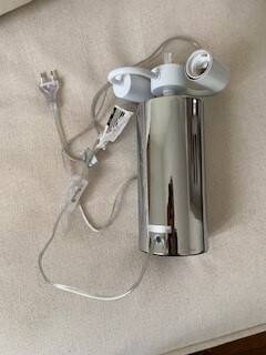 The "Bubble" table lamp in chrome finish, resulting from the collaboration.