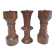 Three vintage patinated solid wood candlesticks