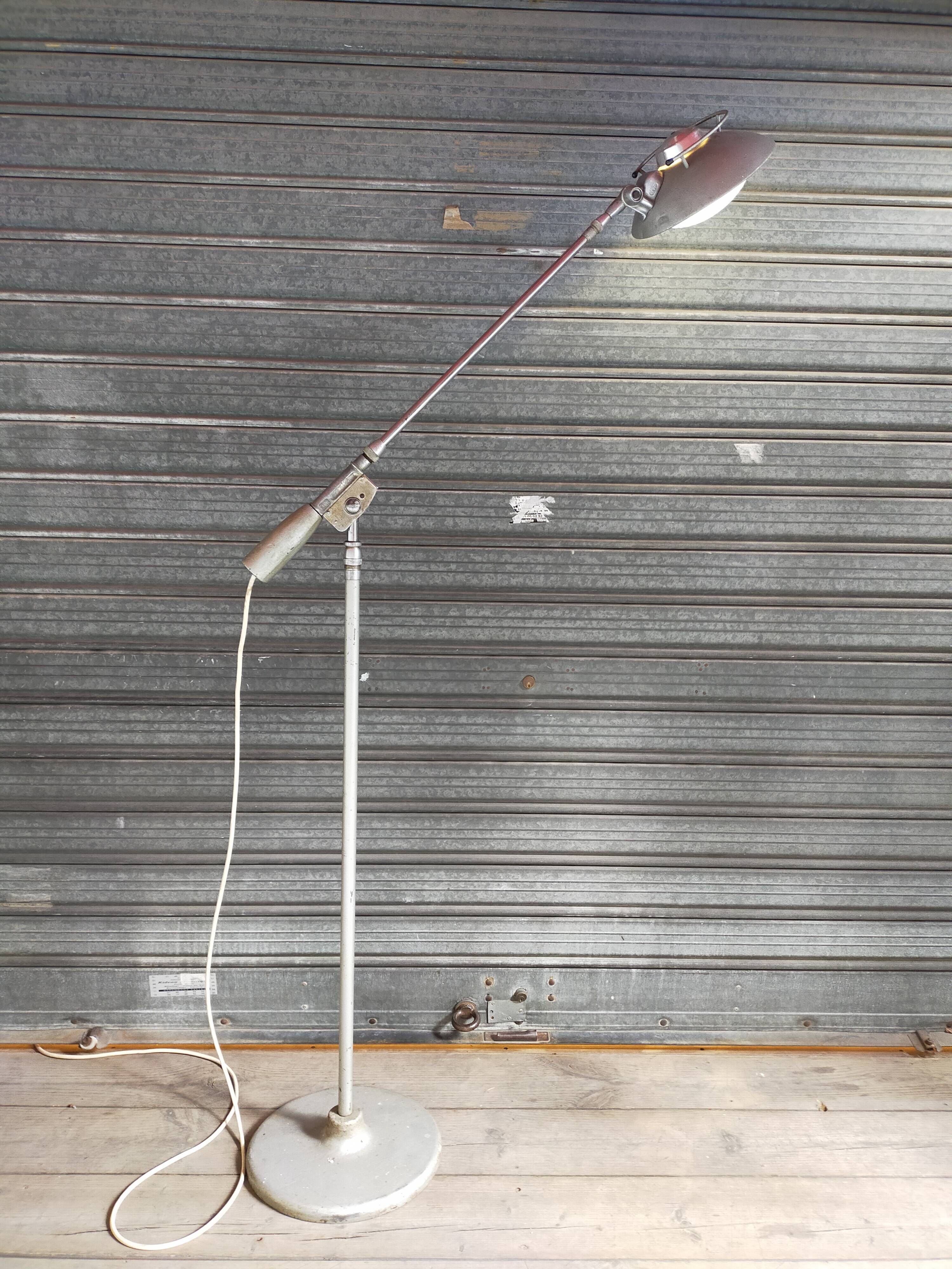Pendulum floor lamp, model 219s, from the 50s by Ferdinand Solere