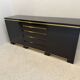 Buffet laqué noir et laiton, 1970s
