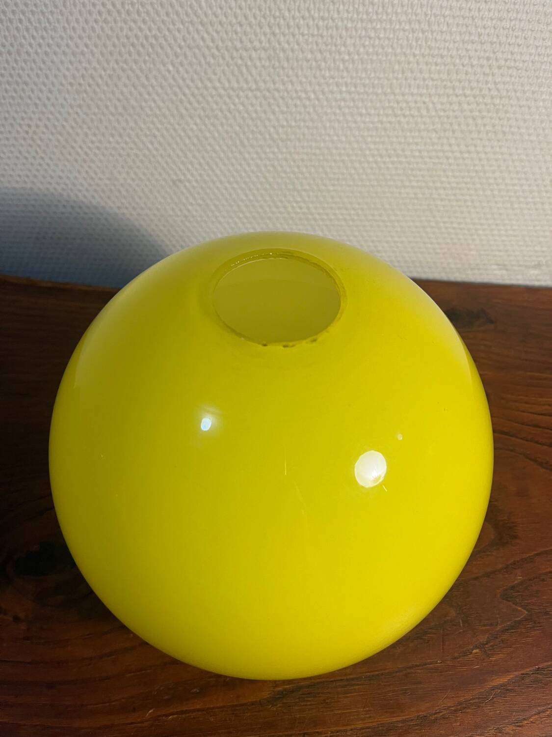 Yellow opaline globe pendant light from the 70s