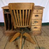 A schoolmaster's desk and chairs