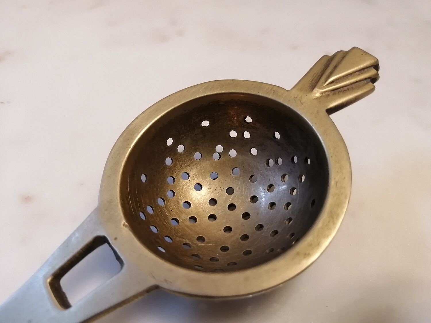 Art deco tea colander