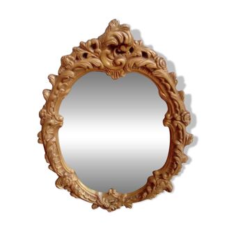 Ornate gold mirror