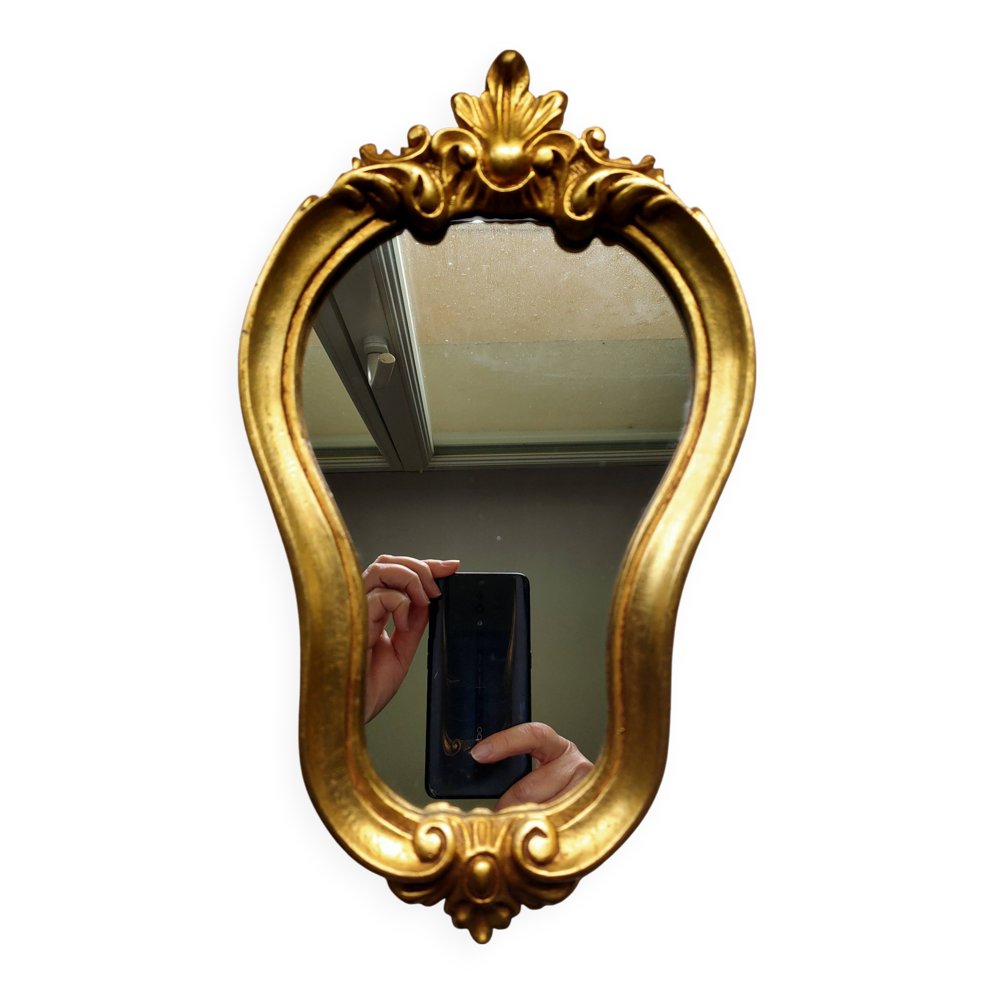Baroque style gilded mirror.