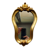 Baroque style gilded mirror.