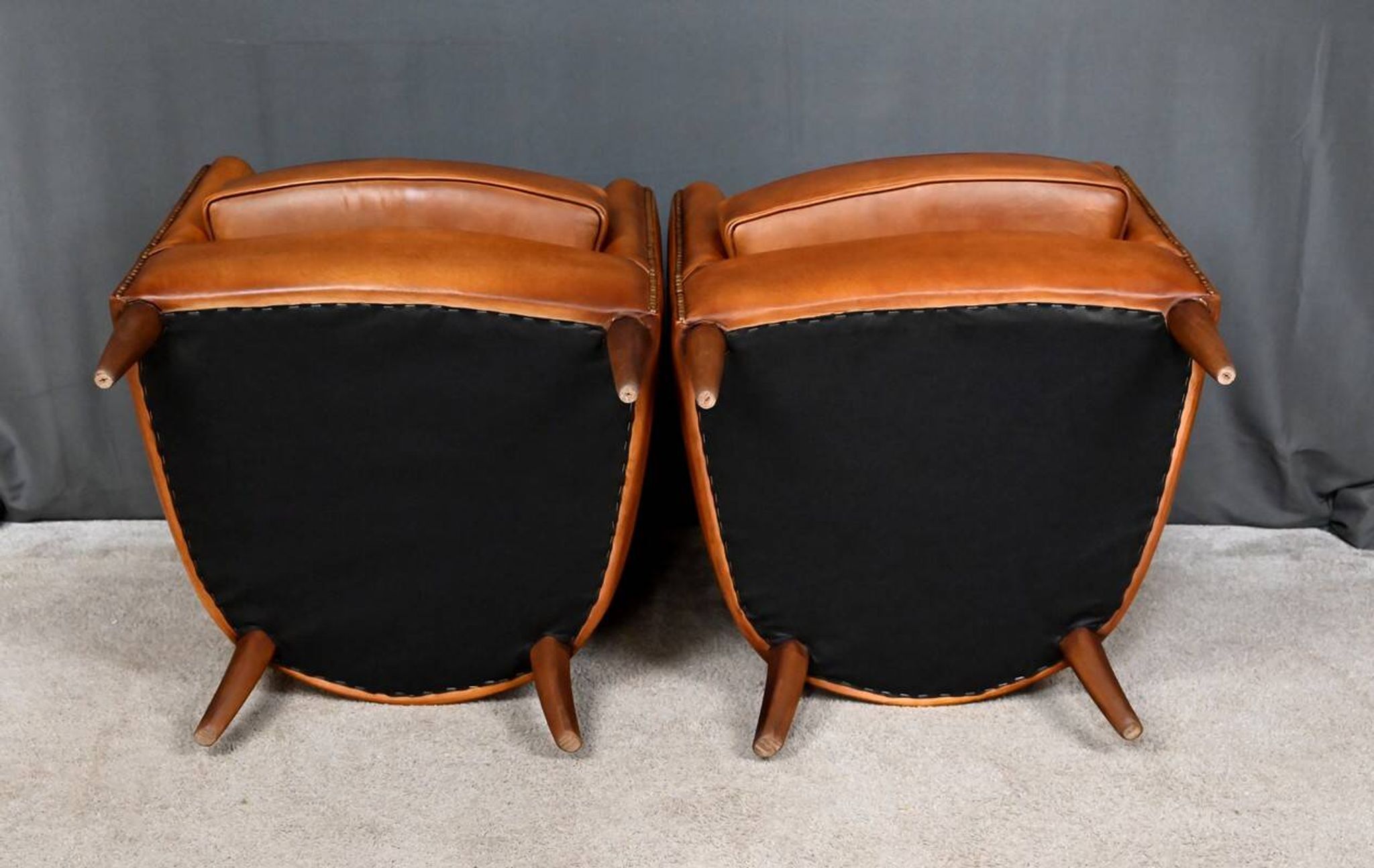 Pair of Solange club armchairs in sheepskin leather – reproduction
