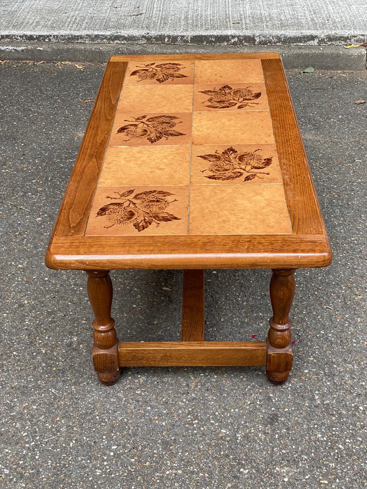 Solid wood and ceramic coffee table from the 1970s.