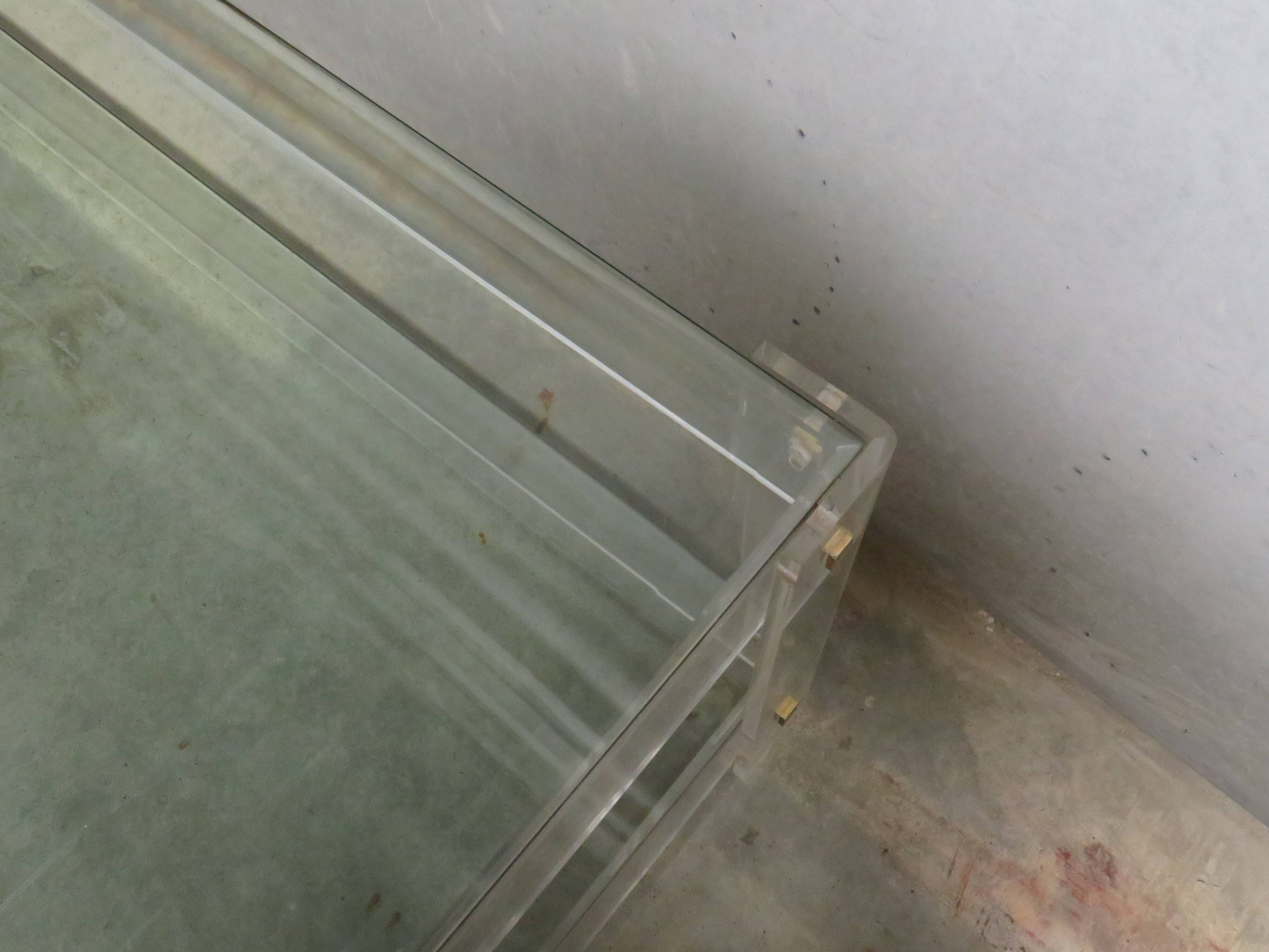 Acrylic and glass coffee table