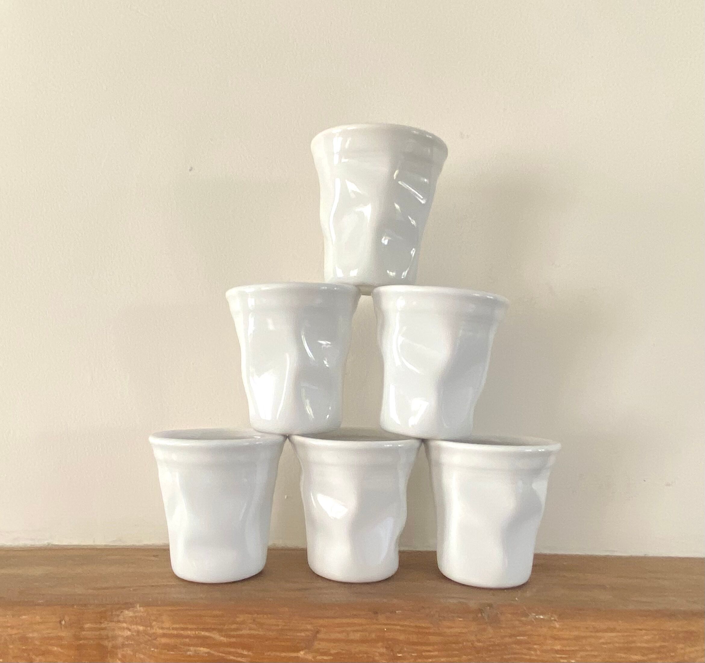 Six cups, glazed terracotta