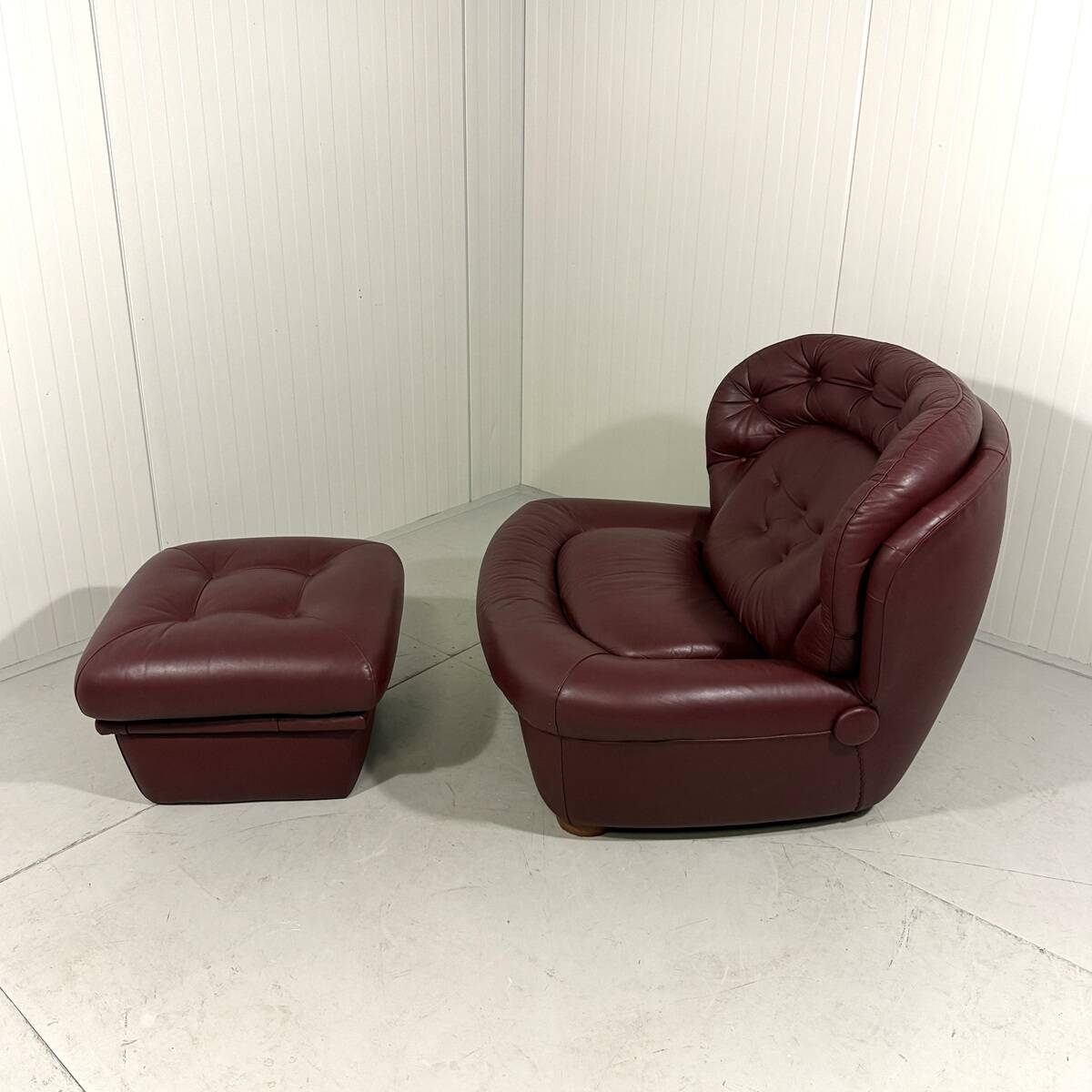 French burgundy leather space age lounge chair & footstool 1970’s