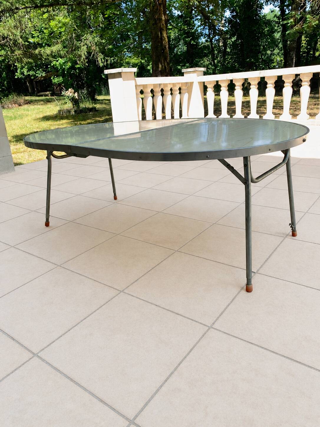 Folding oval table - height adjustable - metal and laminate - 60s/70s.