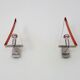 Pair of triangular wall sconces in chrome metal and orange. 1970s.