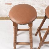 Antique bar stools, brown leather and wood