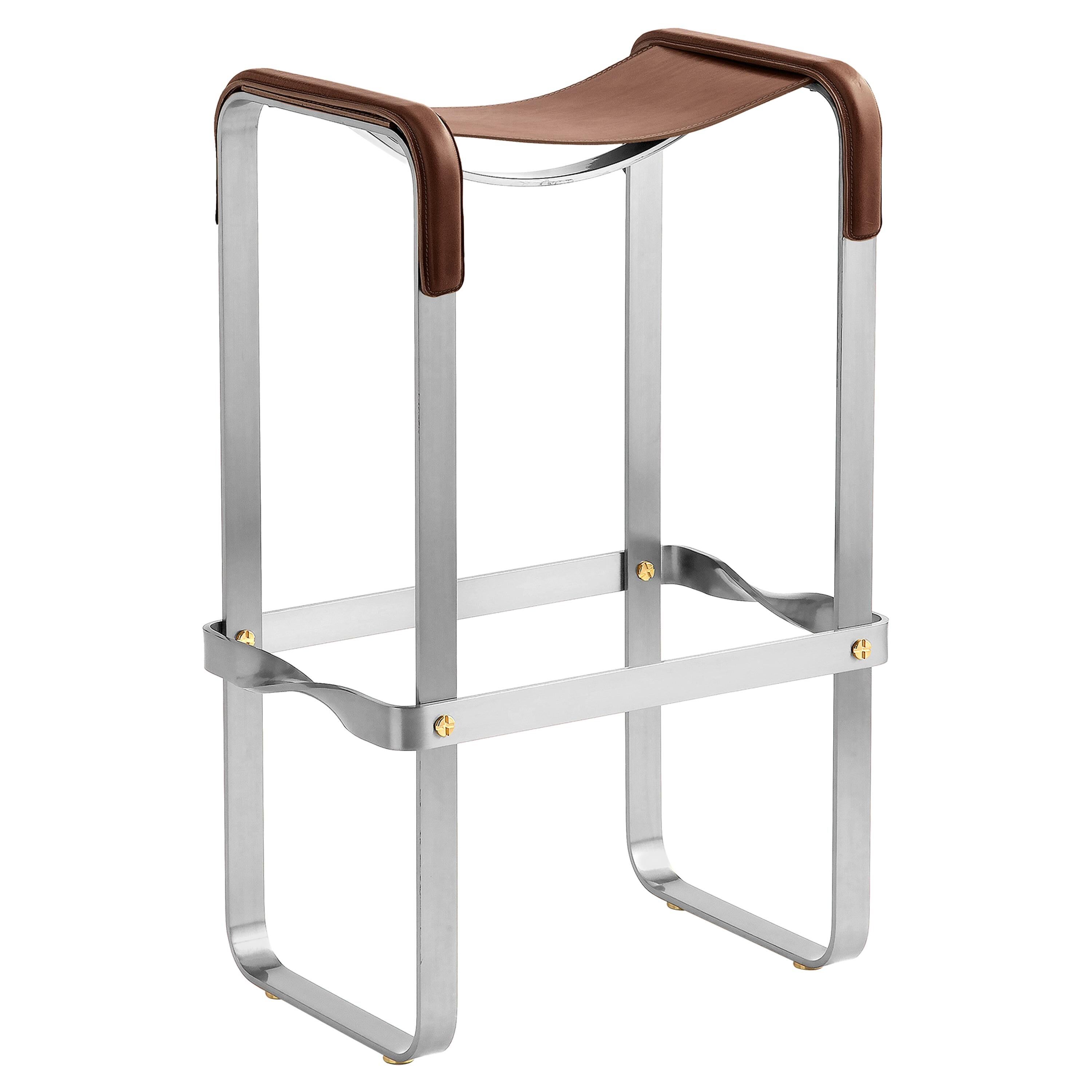 Elegant bar stool in classic contemporary style with aged silver metal and dark brown leather.