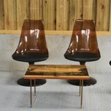 Four swivel chairs - metal base - smoked brown plexi shell - black skaï seat