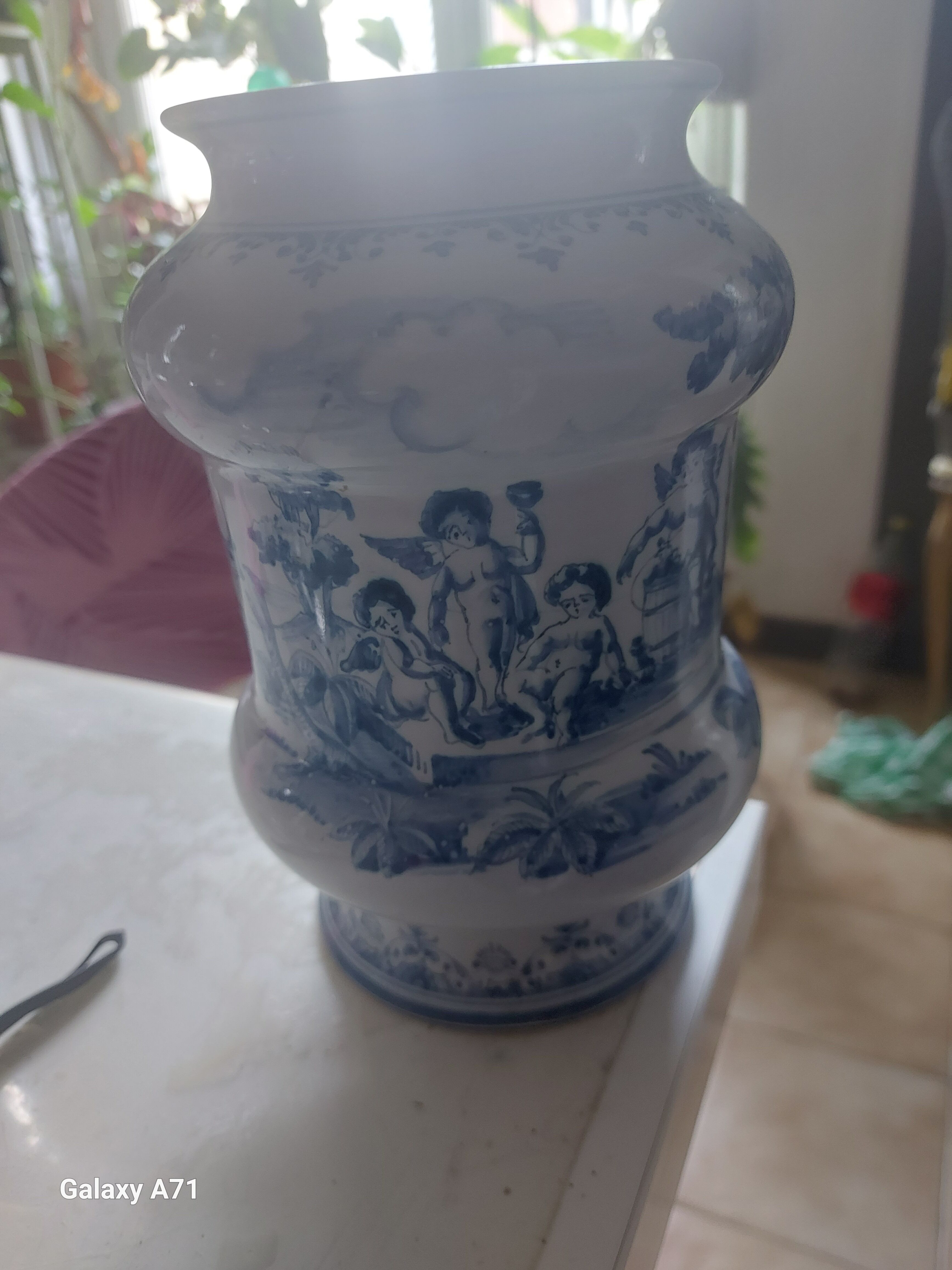 Moustier vase signed