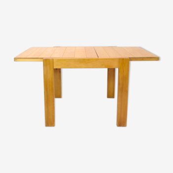 Pine dining table with extensions from the 1980s.