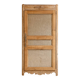 Large antique wardrobe made of wood and burlap.