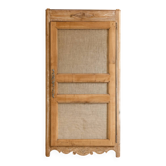 Large antique wardrobe made of wood and burlap.