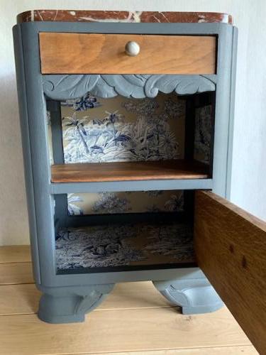 Wooden bedside on art deco marble