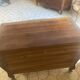 Curved commode with three drawers in light wood, Louis XV style.