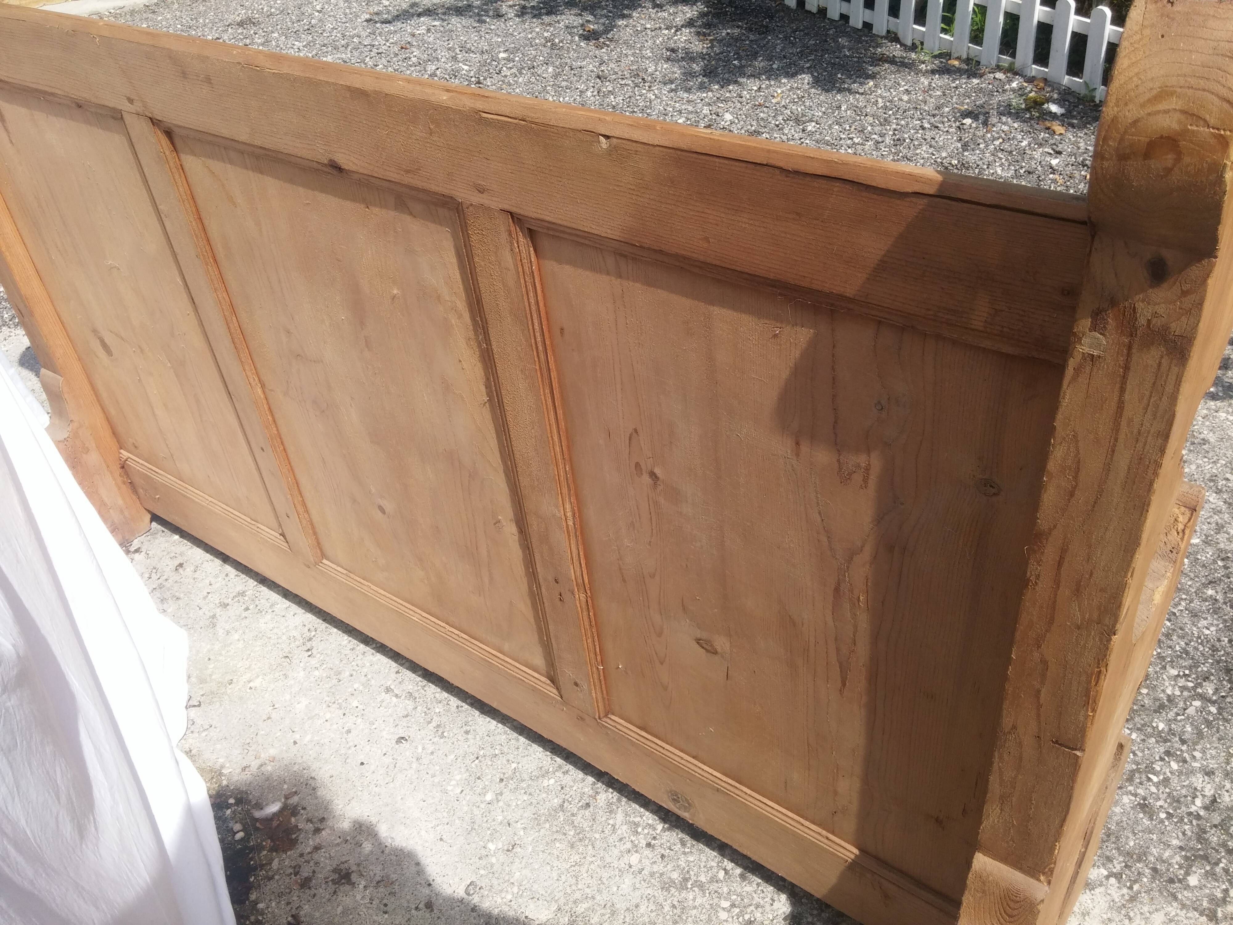 Old shabby English-style pine bench