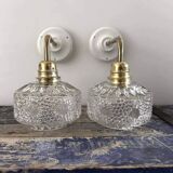 Pair of chiseled glass wall sconces