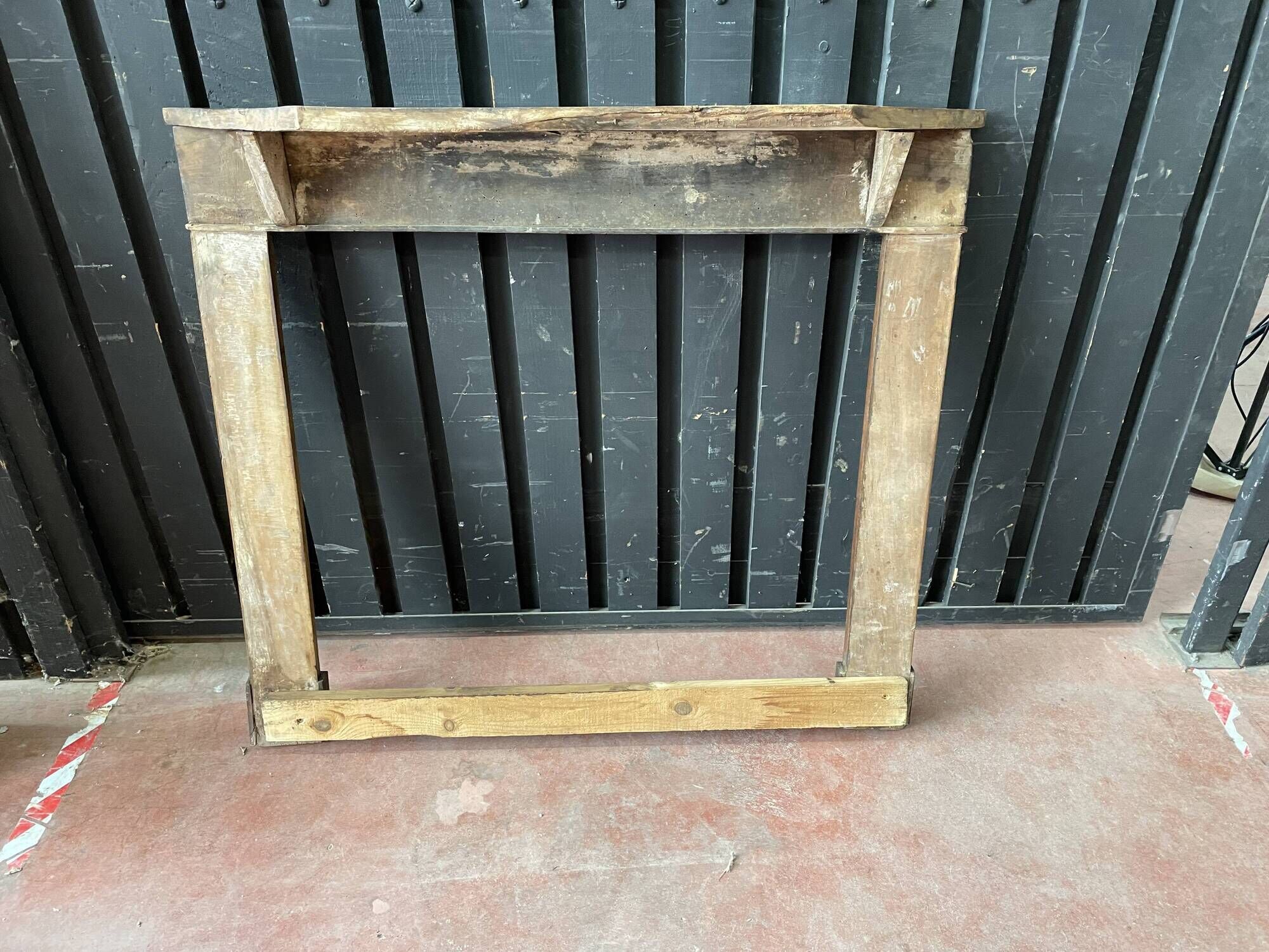 Front or frame or facade of fireplace of the nineteenth century in walnut wood carved by hand.