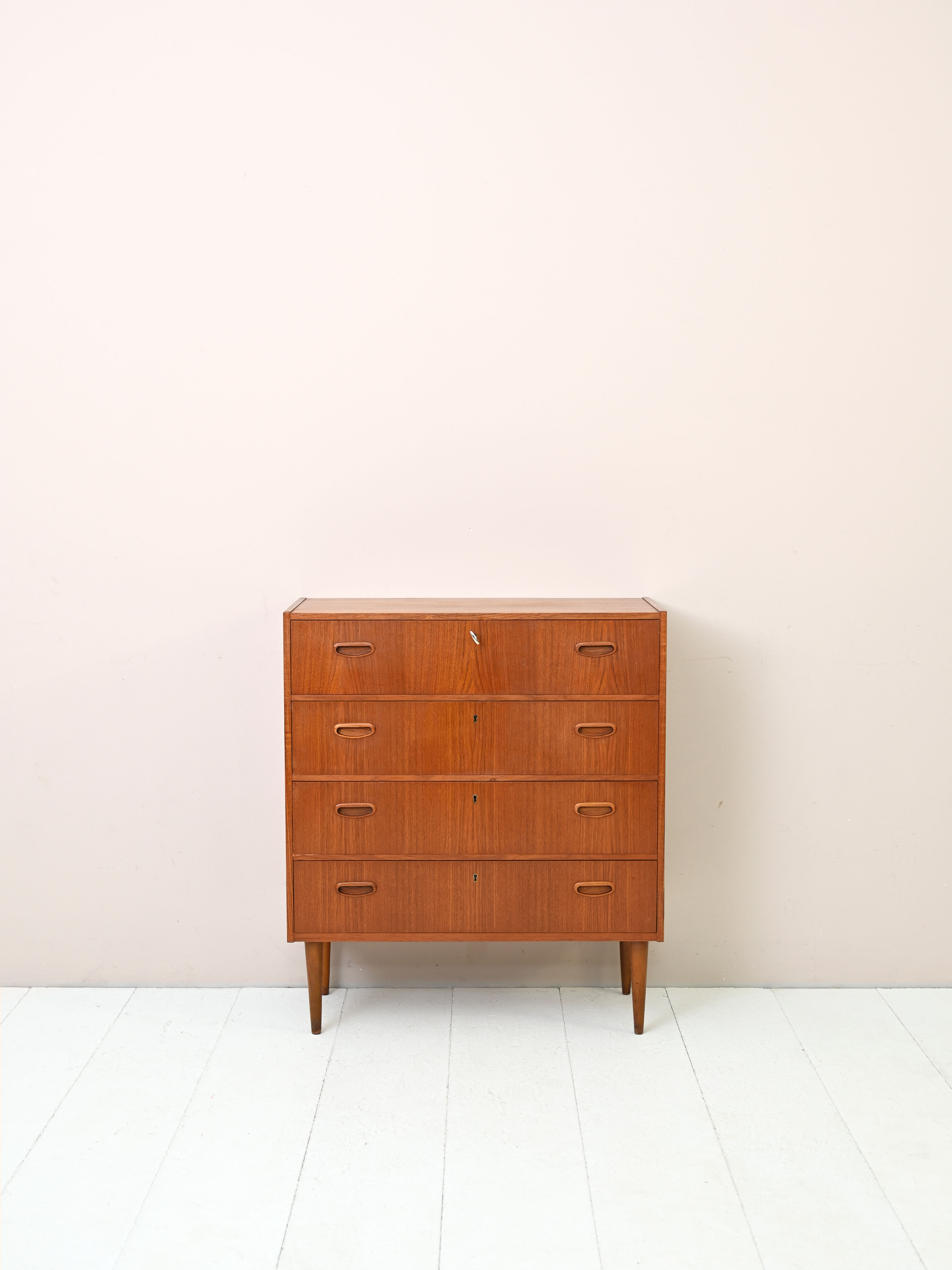 Modern antique chest of drawers with four drawers