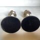 Pair of silver metal candlesticks