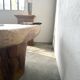 Organic brutalist coffee table in solid cedar, trunk pedestal, 1970s.