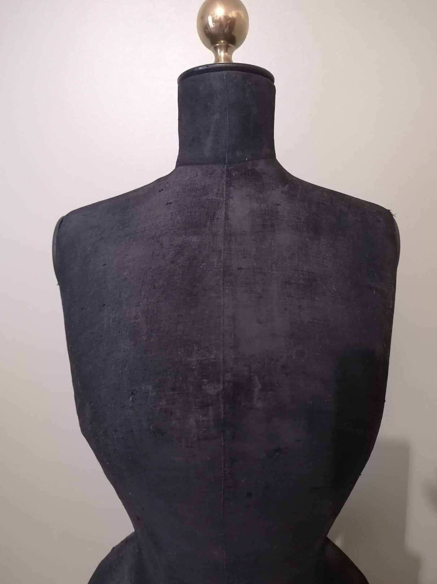 Old bust of seamstress called "wasp size"