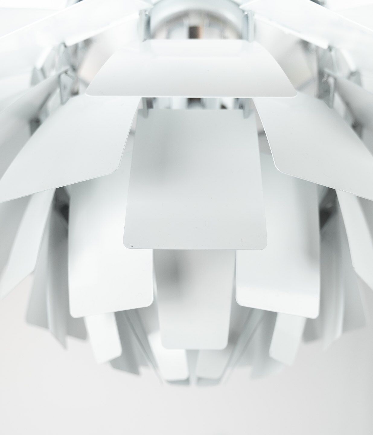 White artichoke, Ø48, designed by Poul Henningsen in 1958 and manufactured by Louis Poulsen.