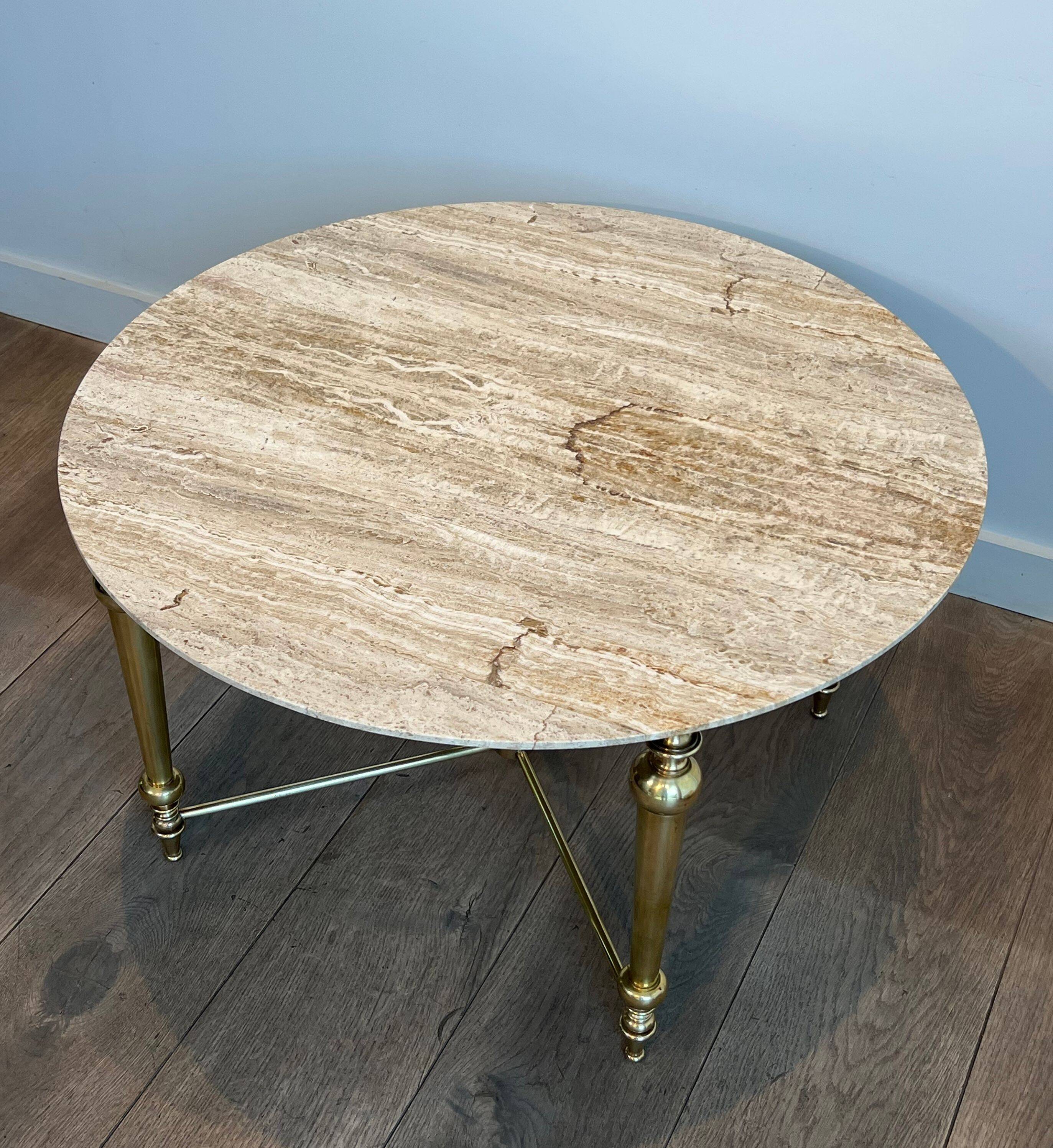 Brass coffee table with a white marble top.