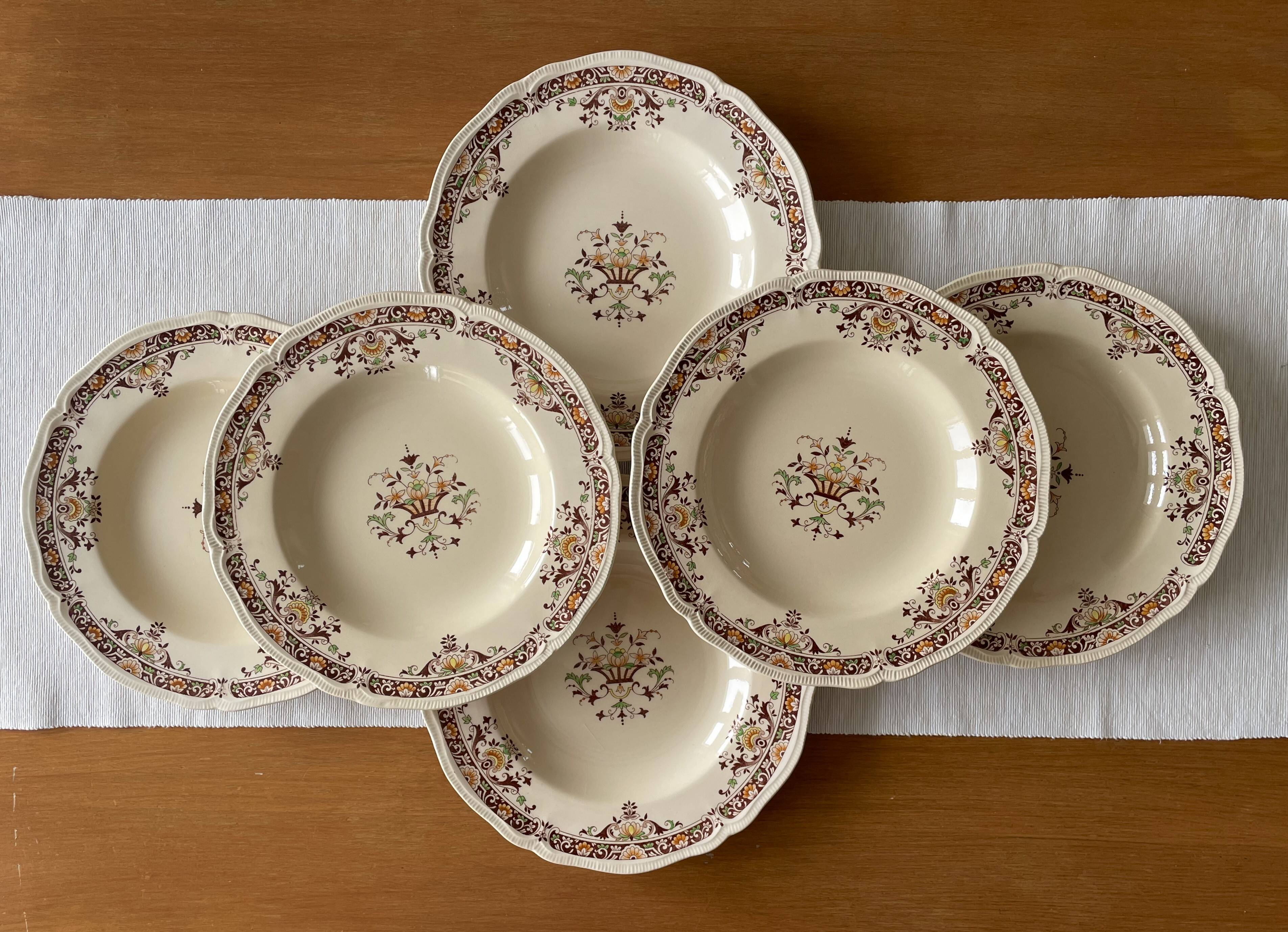 6 antique semi-deep plates in Longchamp earthenware.