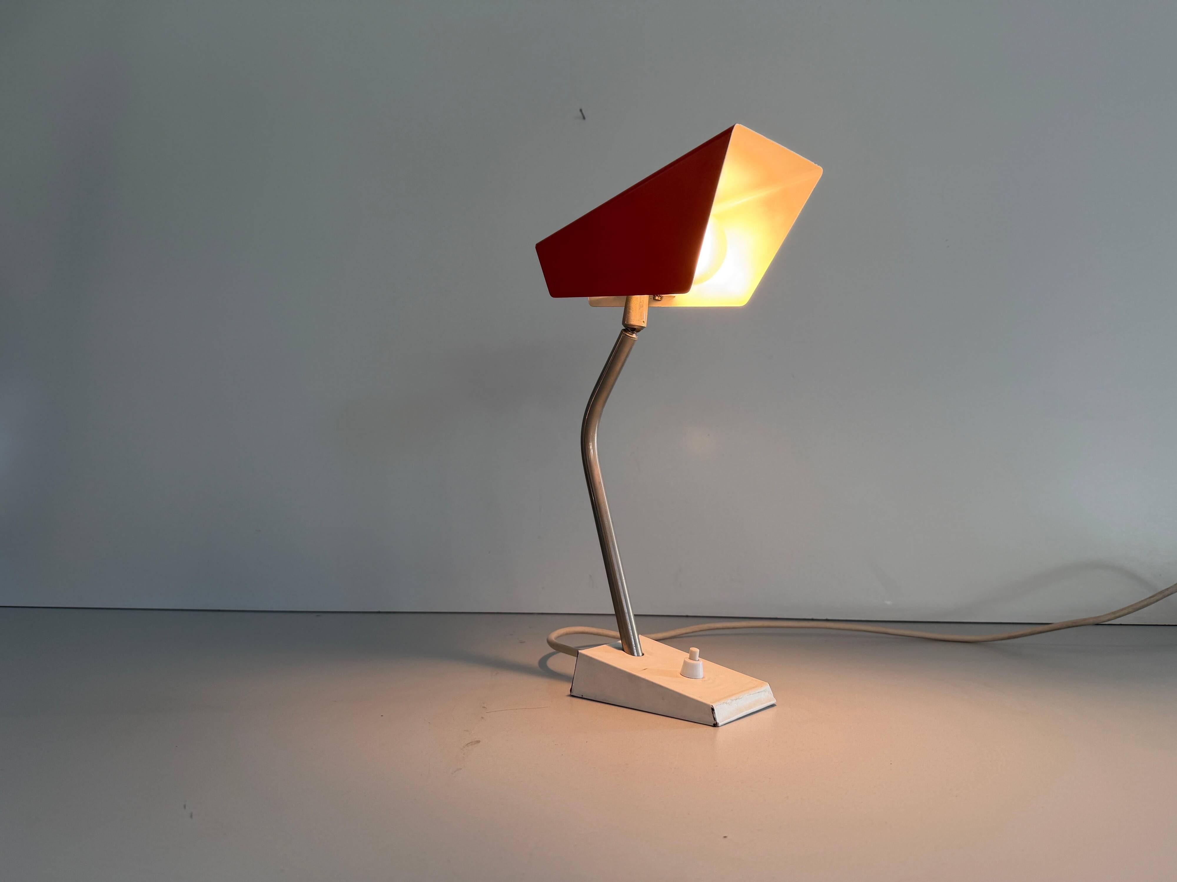 Table lamp with a red metal head, 1960, Germany