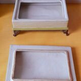 Porcelain box on claw feet