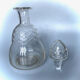 Old carafe in blown glass pattern engraved braces