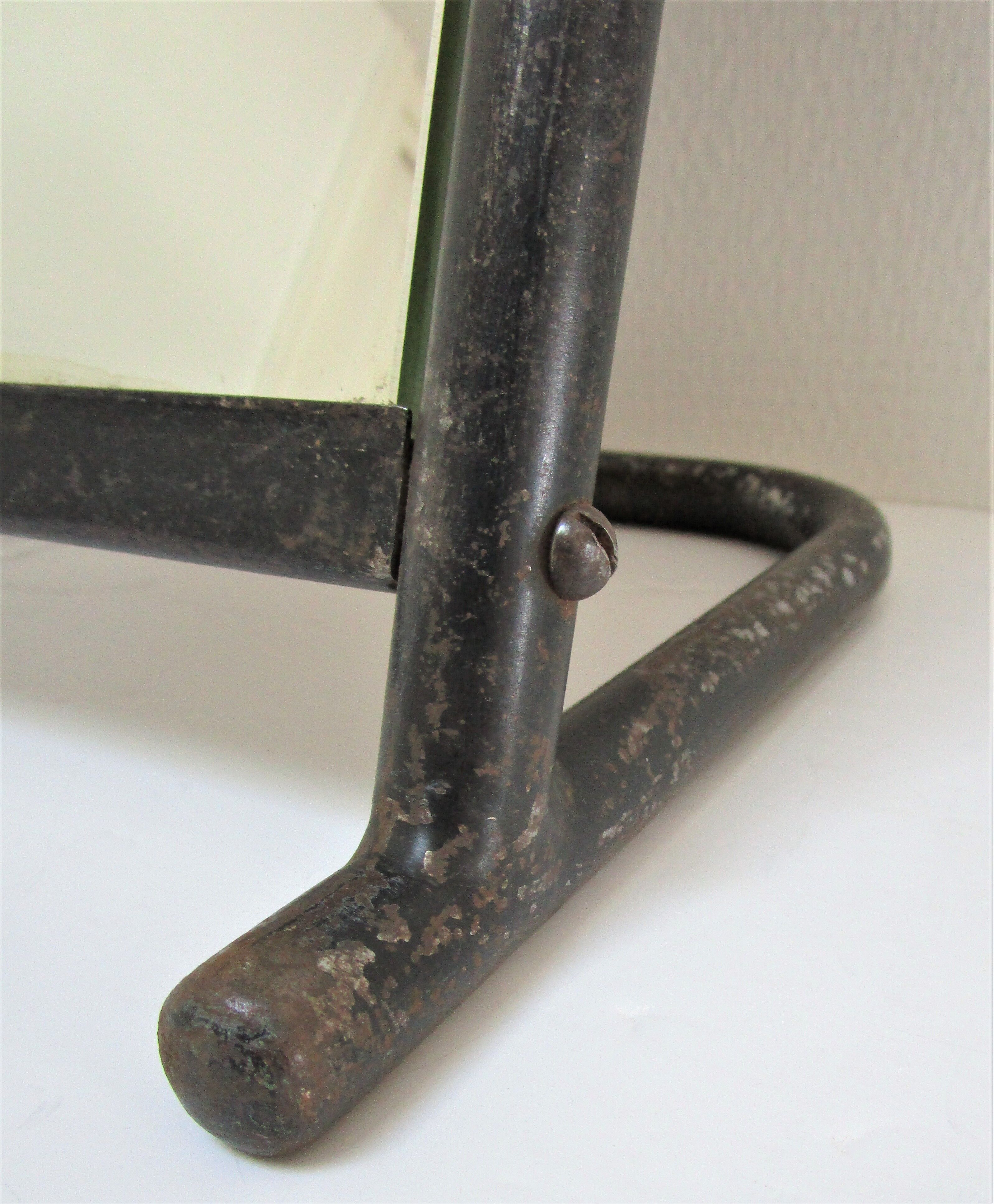 Vintage patinated metal shoe mirror