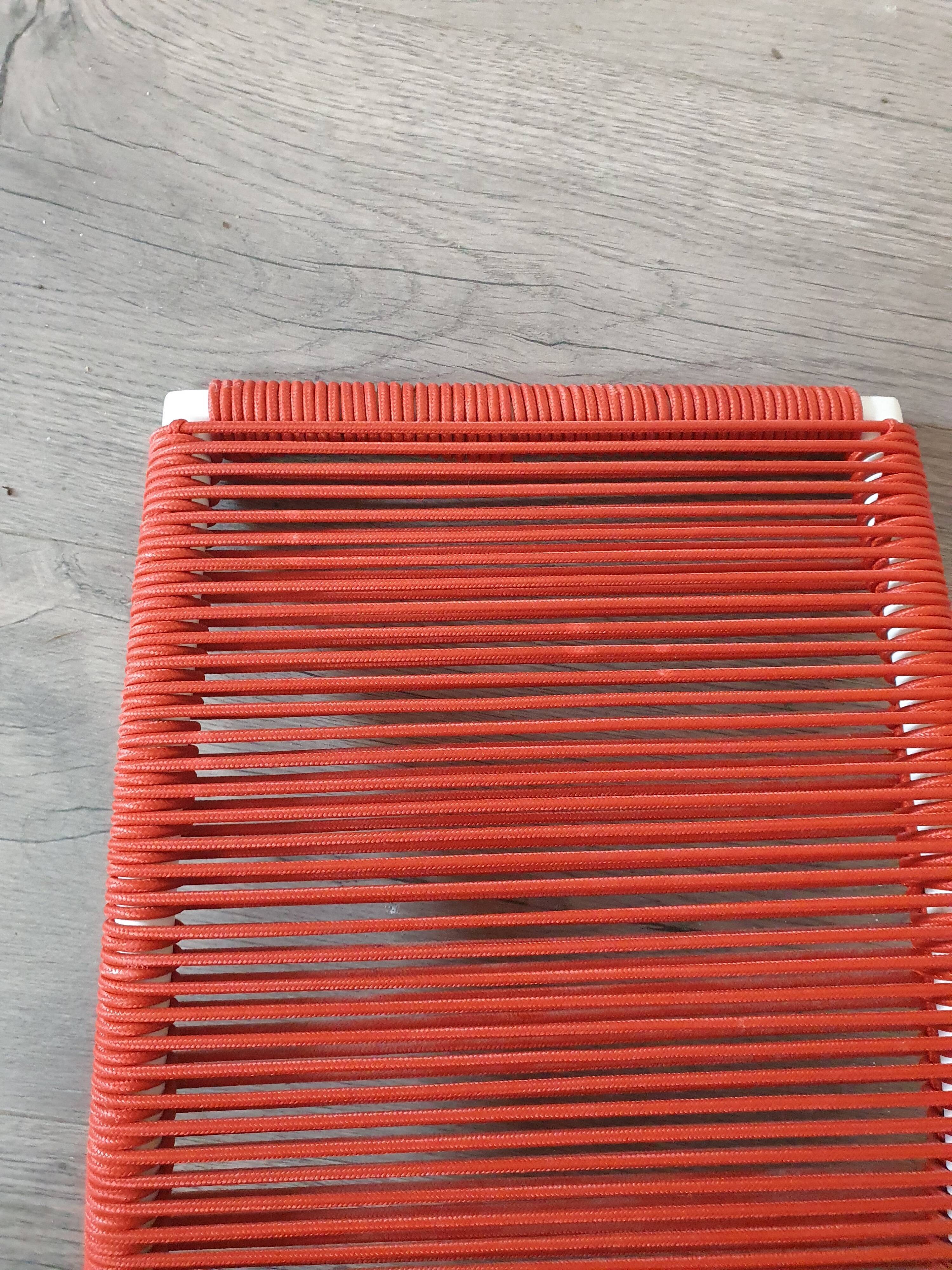 Vintage children's chair in white matel (some splinters of paint) with red scoubidou rope year 70