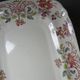Antique Longchamp serving platter with polychrome daisies in ironstone.