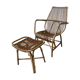 Rattan armchair and his feet rest