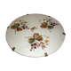 Ceramic plate underside on bronze stand