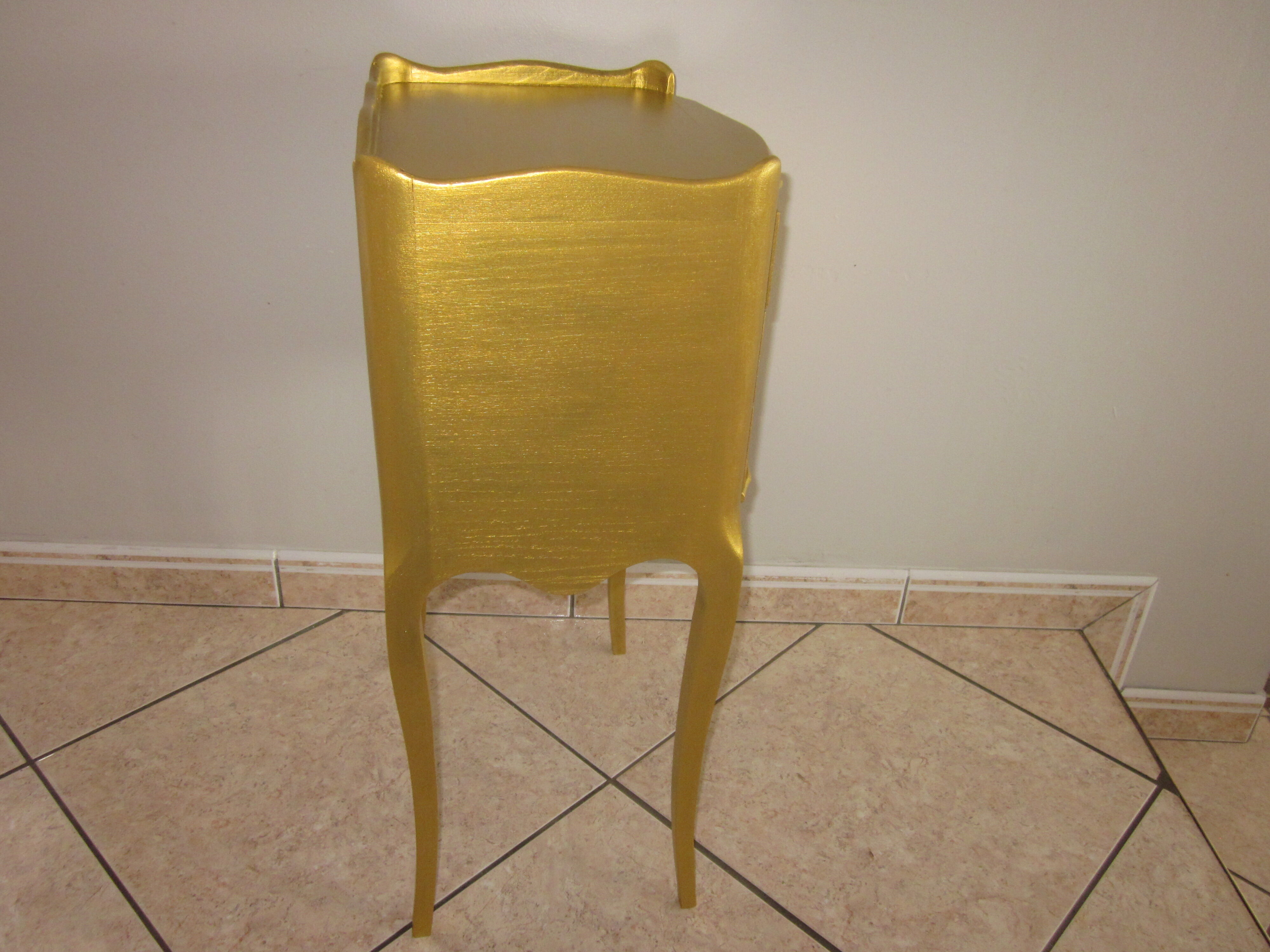 Gilded wooden bedside