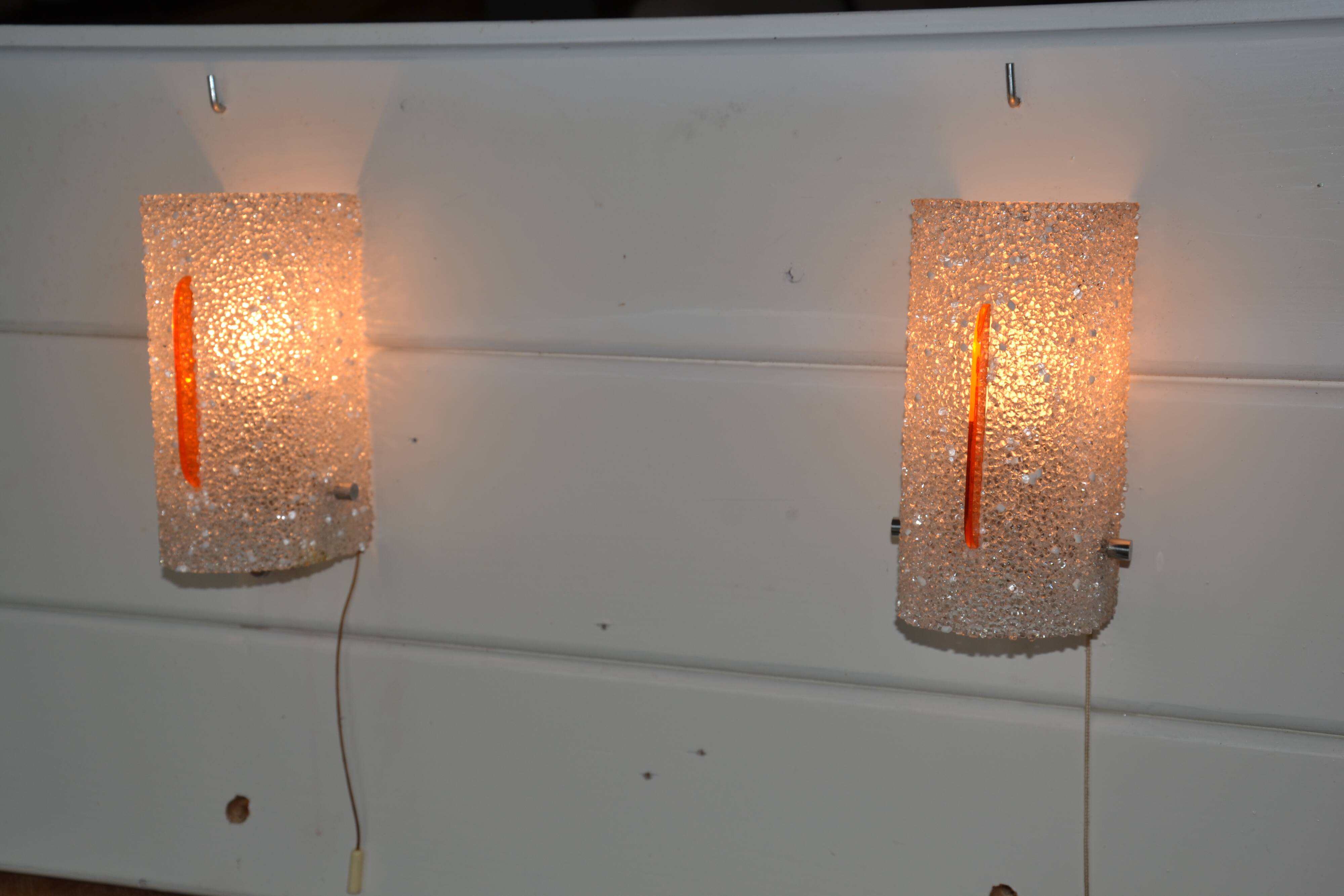 2 orange perspex and plexiglass wall lights from the 60s-70s.