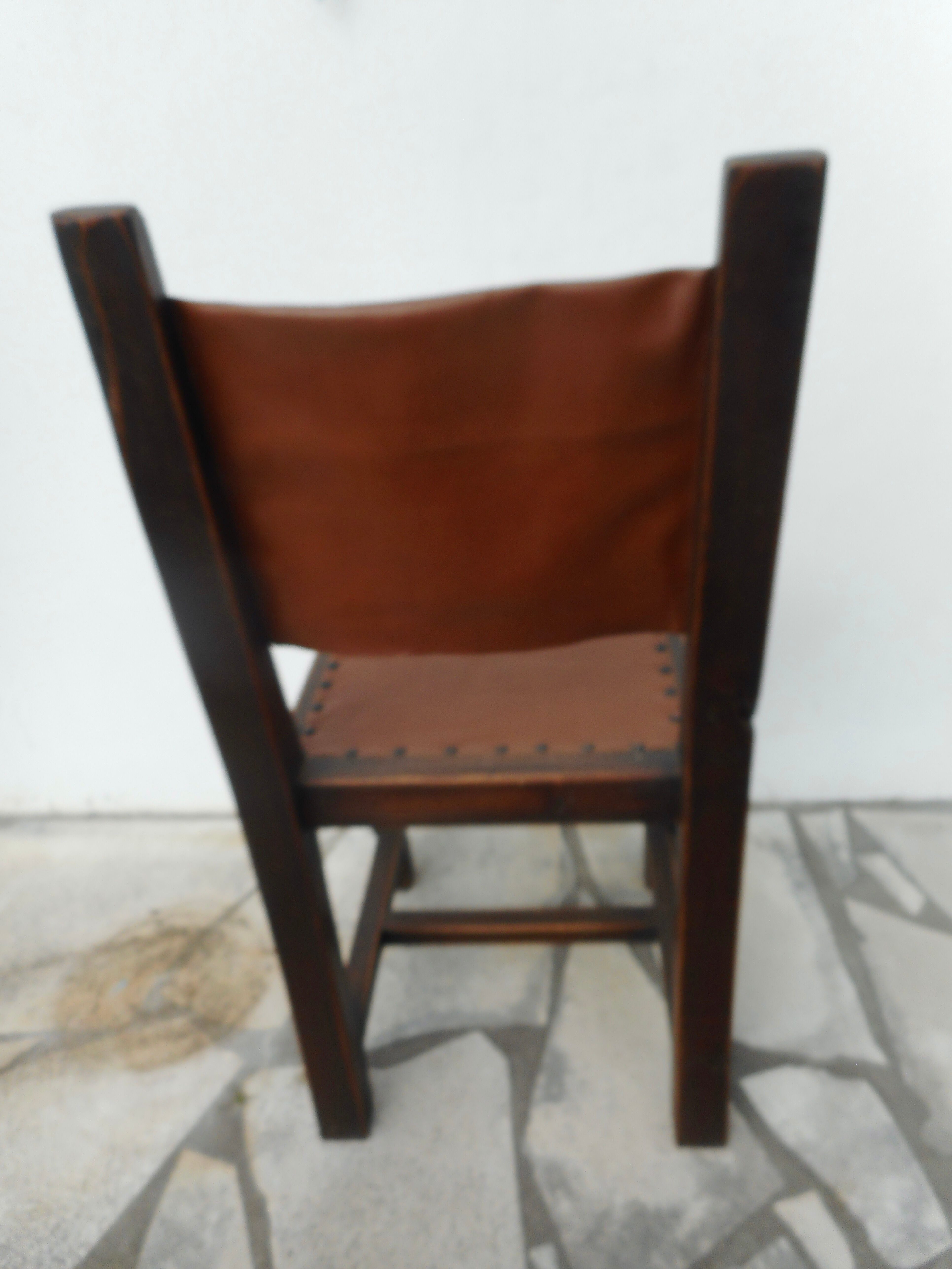 Series of 4 wood and leather chairs