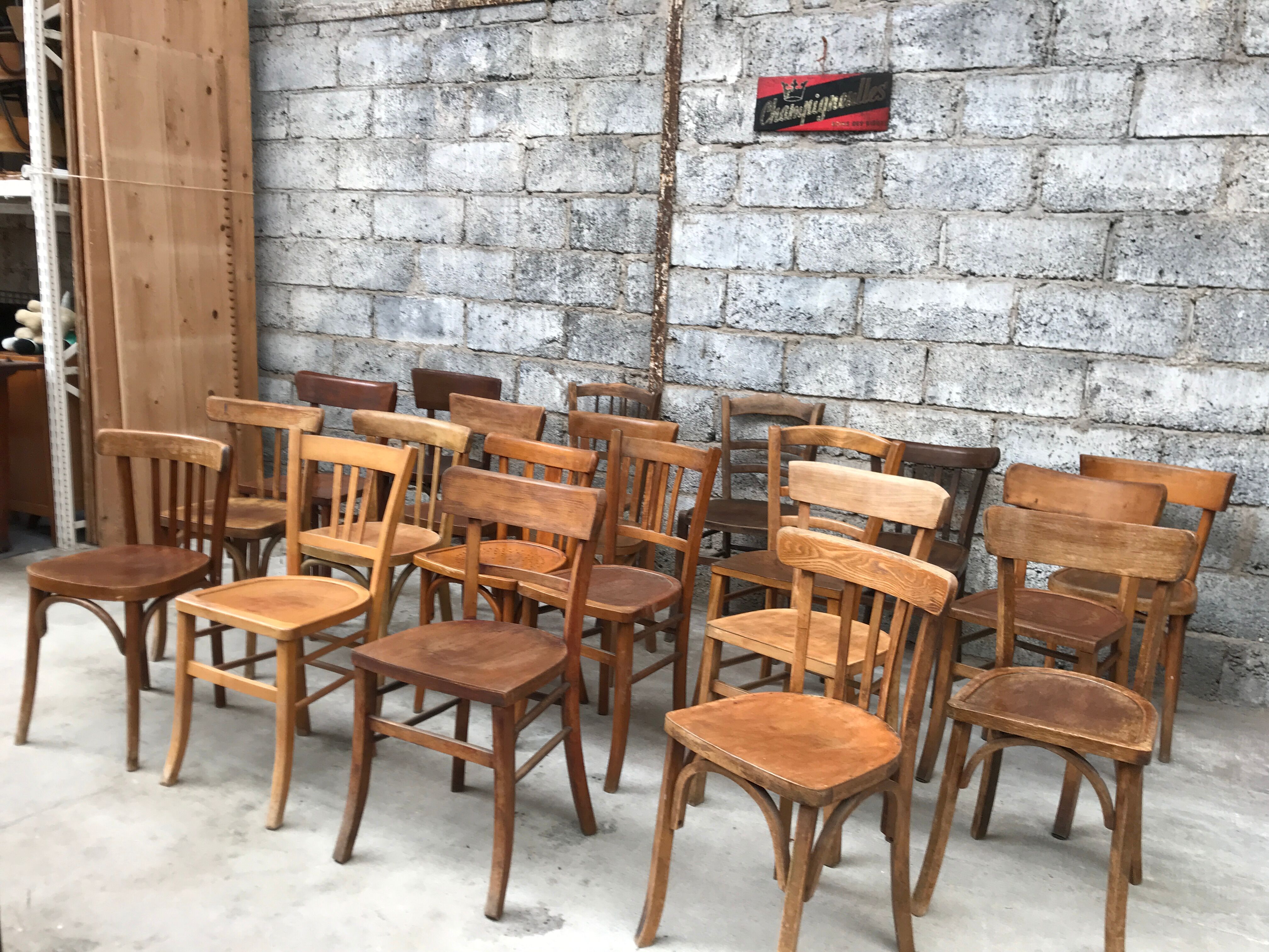 Set of 15 mismatched curved wood bistro chairs