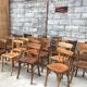 Set of 15 mismatched curved wood bistro chairs